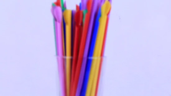 Orange Straws with Pointed Spoon for Frozen Drinks on Parties